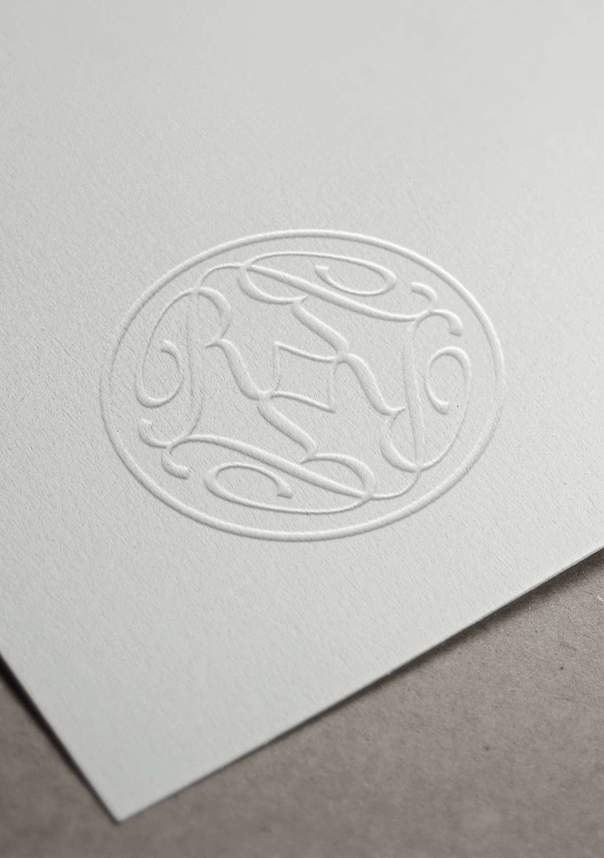 Rowan Campbell-Pilling monogram embossed into off-white paper